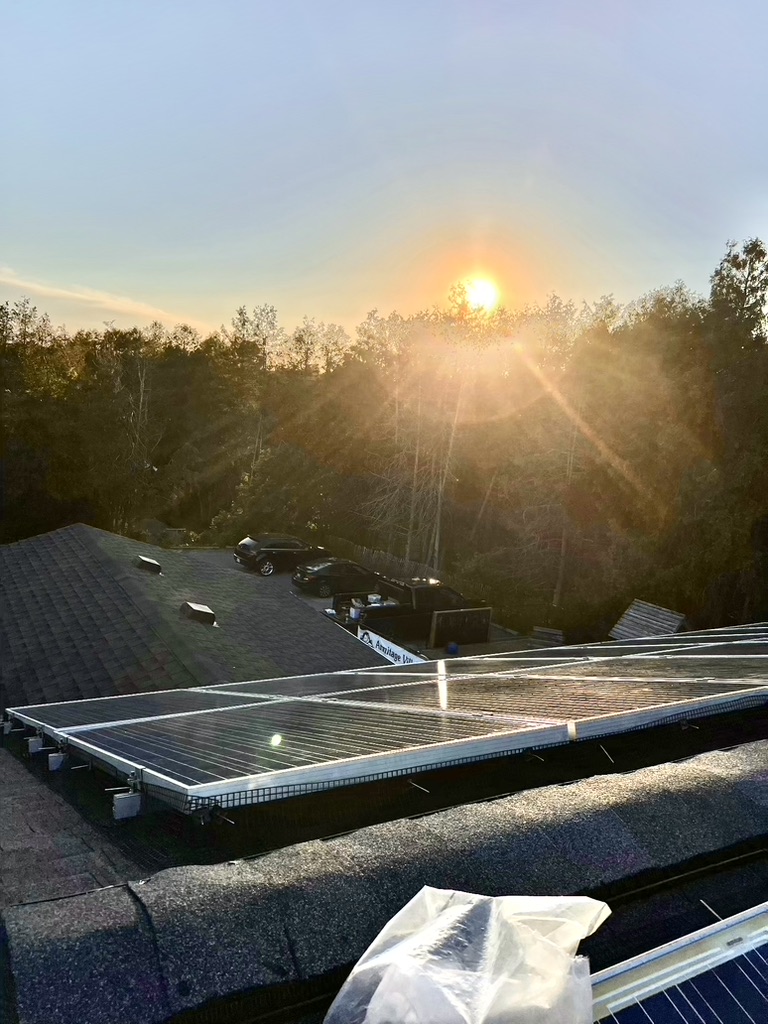 Technician installing solar panels